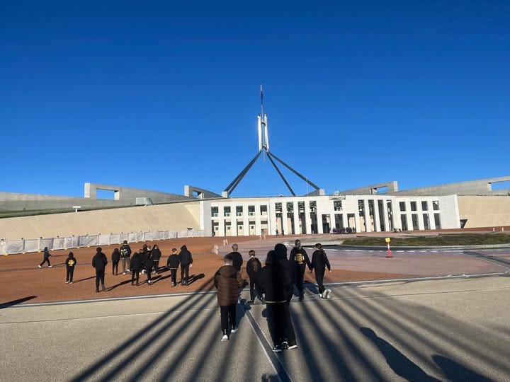 students oustide parliament house